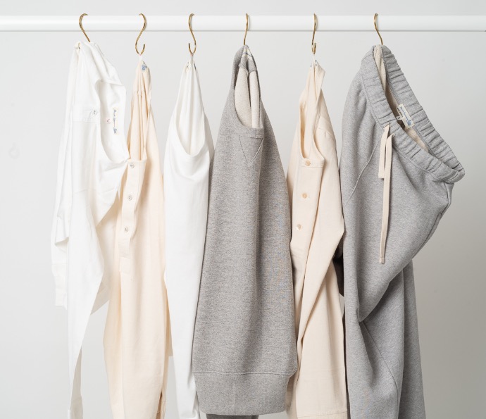 t-shirt henelys sweatshirts and pants hanging on rack