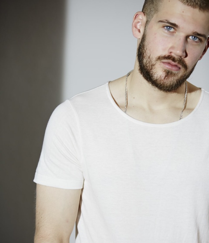 man wearing loopwheeled organic cotton t-shirt in nature