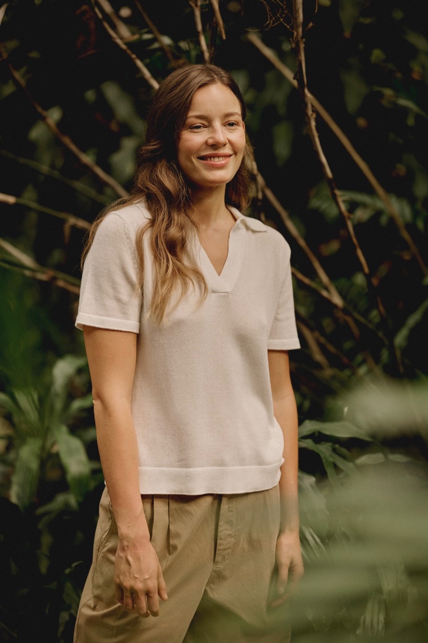 woman wearing knitted V-neck t-shirt